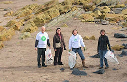 Anne-Marie leads a Green Action Team during a clean up of Spittal beach