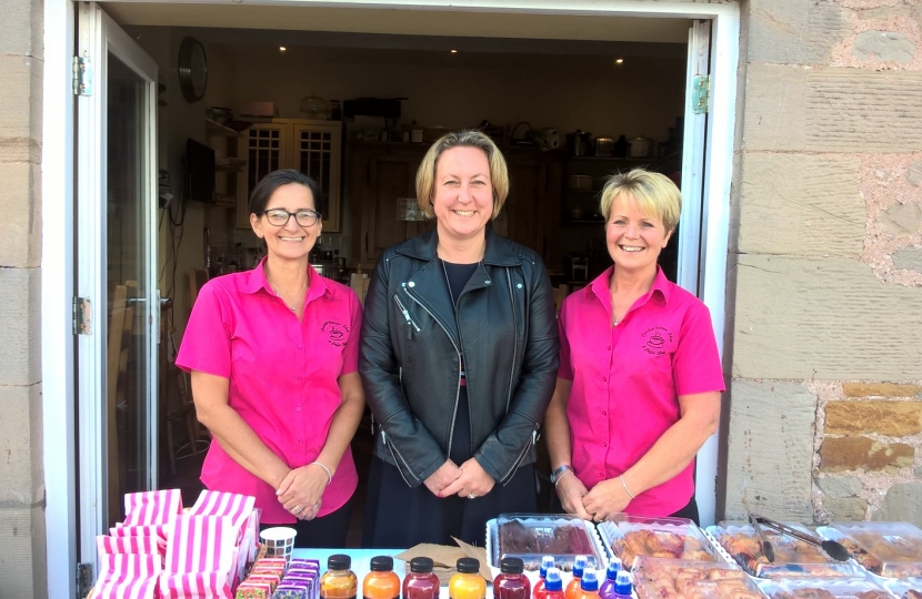 Anne-Marie with Linda Waite and staff at Cornhill Village Shop