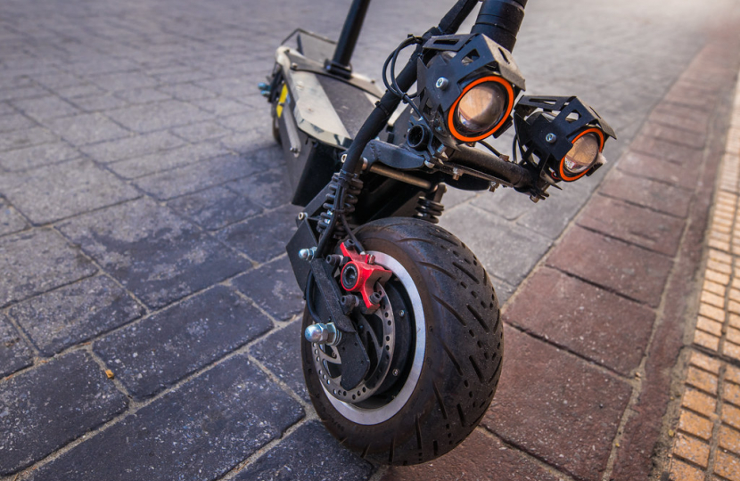 "Powerful looking e-scooter with disc brakes and twin headlights" by Ivan Radic is licensed under CC BY 2.0.