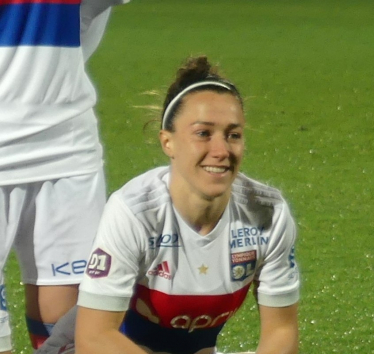 File:Lucy Bronze 2018 OL (cropped).jpg" by DOMINIQUE MALLEN is licensed under CC BY-SA 2.0.
